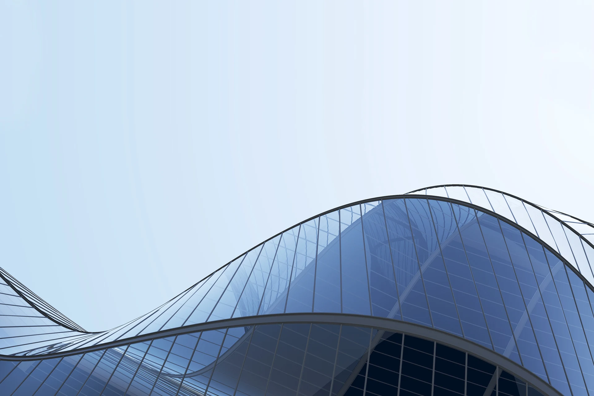 Curved glass facade representing innovation in insurance solutions