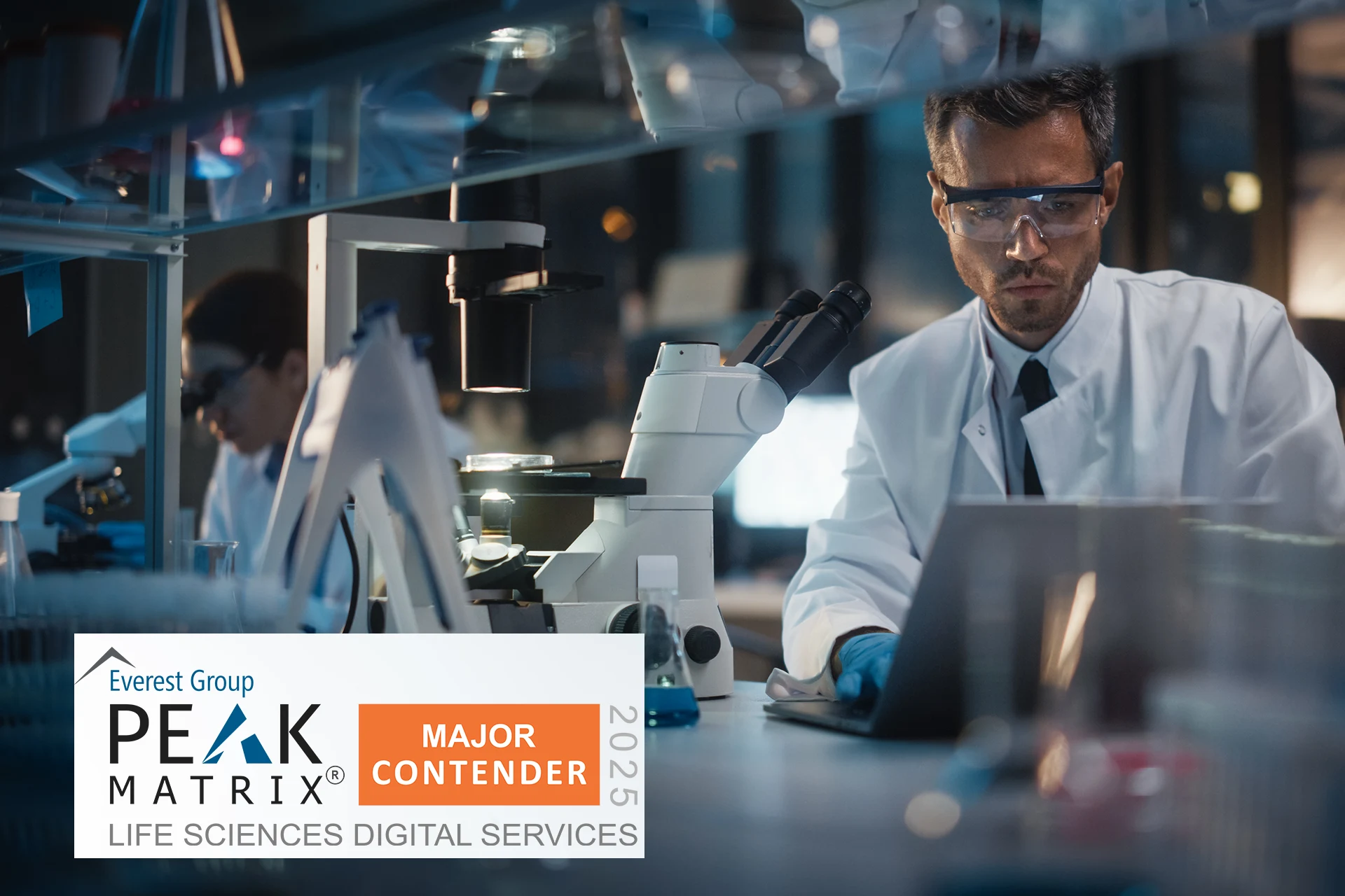 Scientist in lab working with a microscope for Zensar's LS Digital 2025