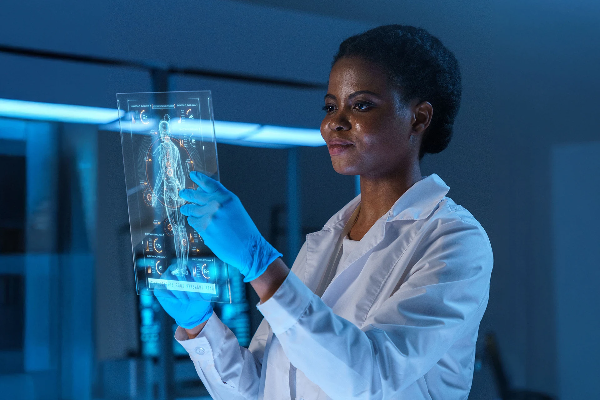 Professional examining a holographic medical display in a lab setting.