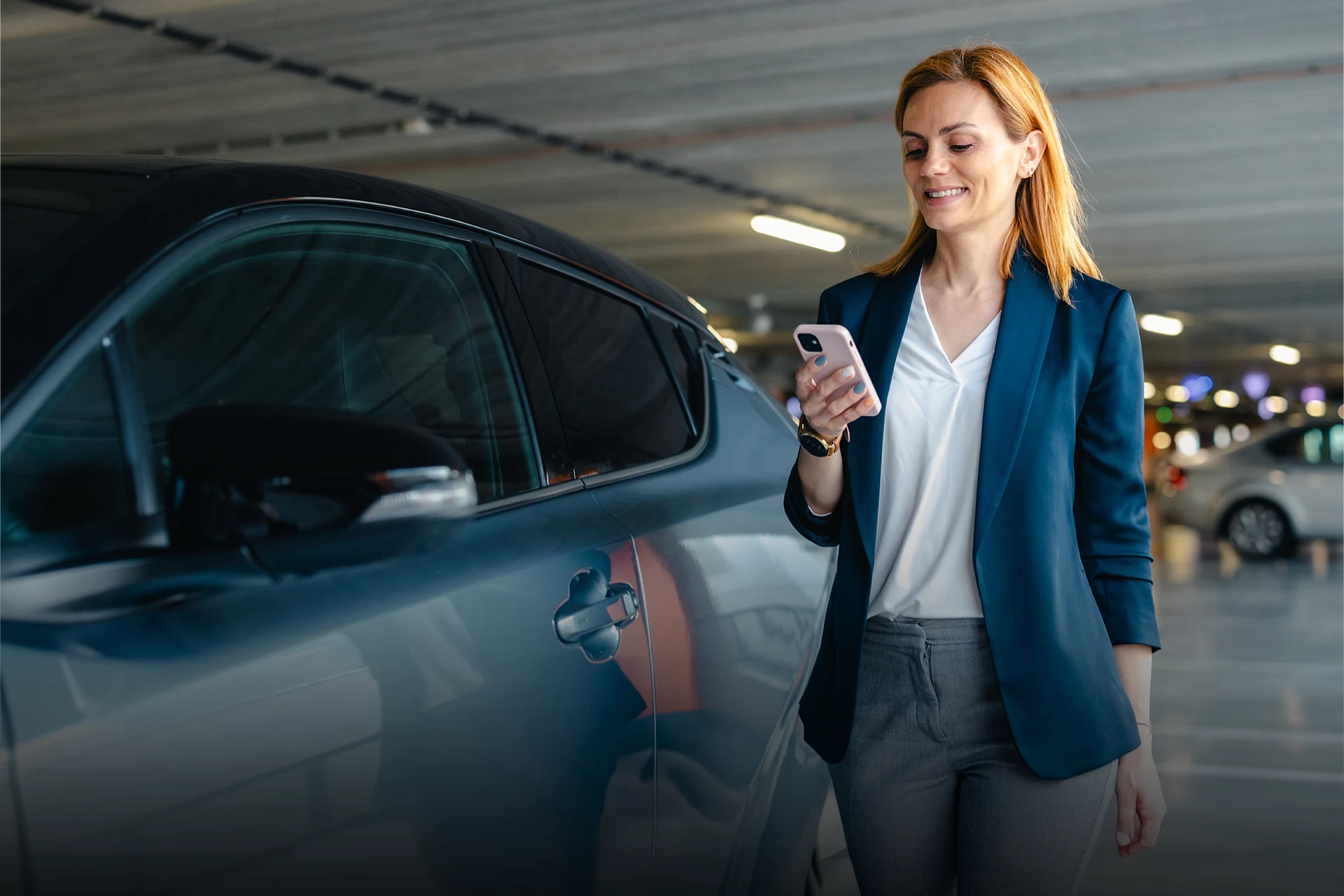 Person using a mobile phone to access digital insurance interface, showcasing insurance solutions.