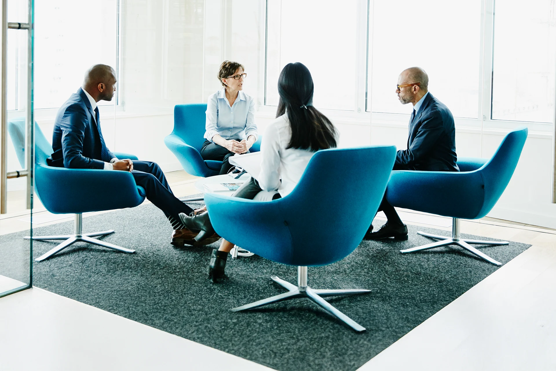 Zensar leadership team collaborating during a strategic business discussion