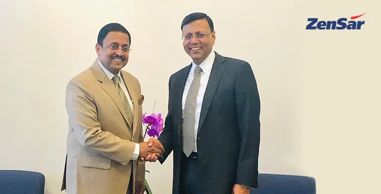 Ambassador Sanjay Panda shaking hands with corporate executive at San Jose office