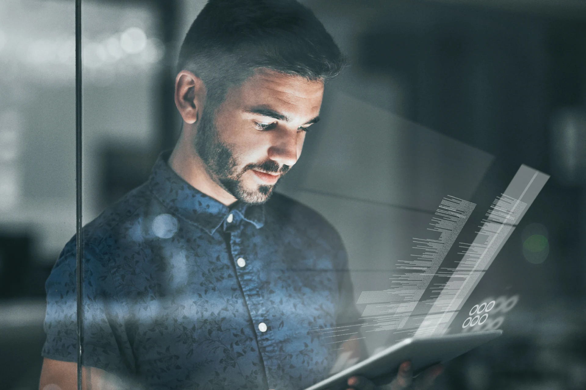 Professional engaging with digital data on a laptop for SAP S/4HANA insights