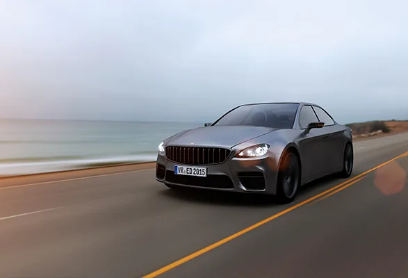 Sports car driving along coastal road curve for Everest Group QA services