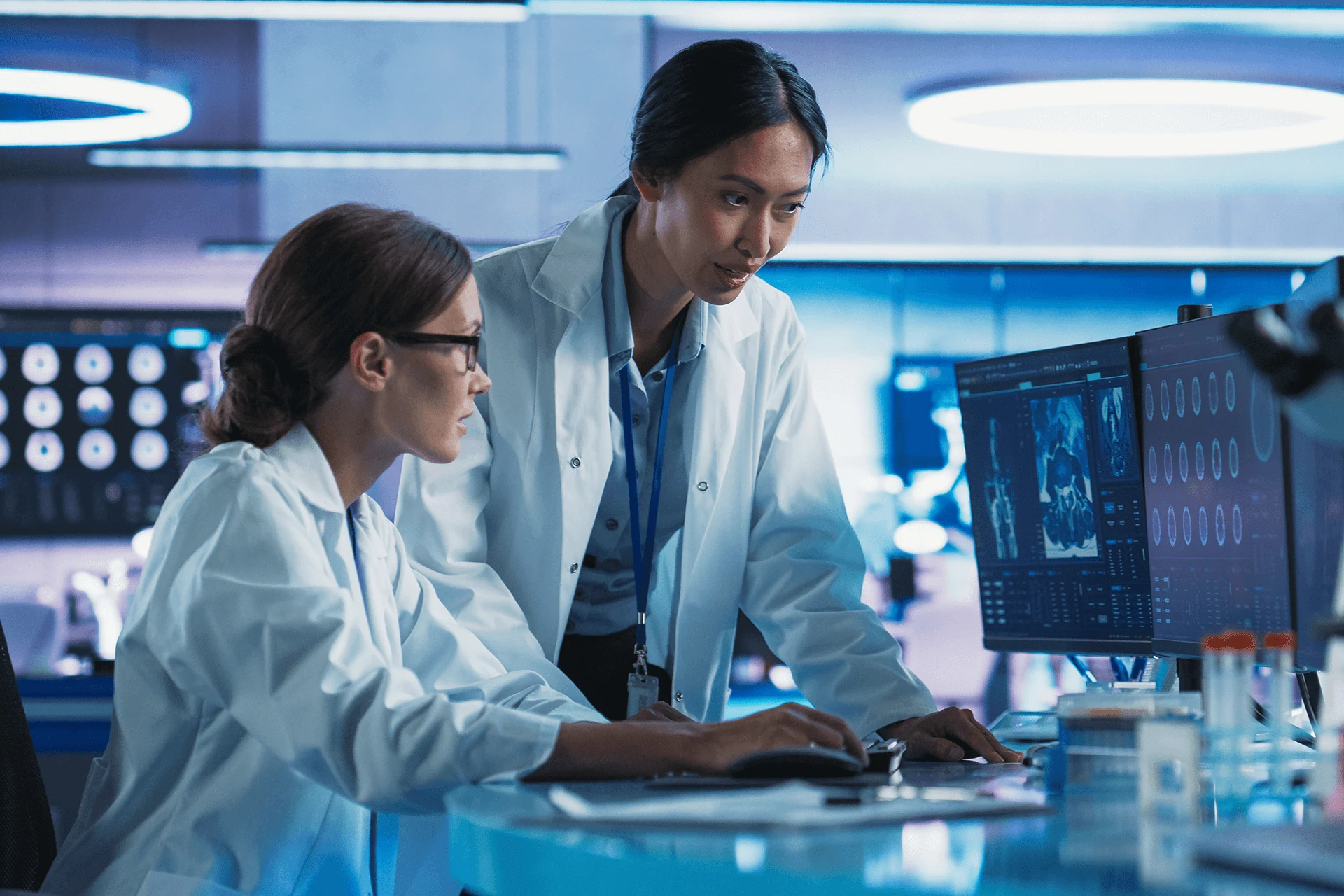 Two healthcare professionals collaborating on a clinical platform design