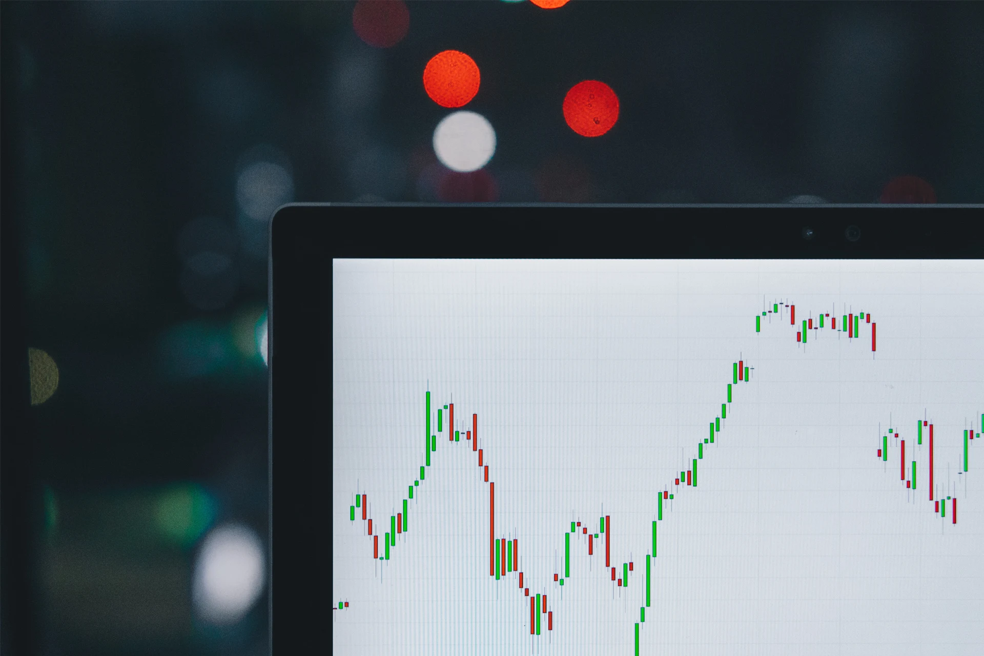Stock market graph displayed on a laptop illustrating financial data trends