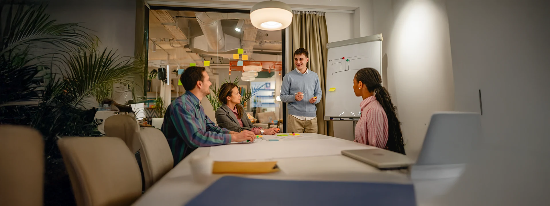 Product teams collaborating on streamlined product coaching strategies