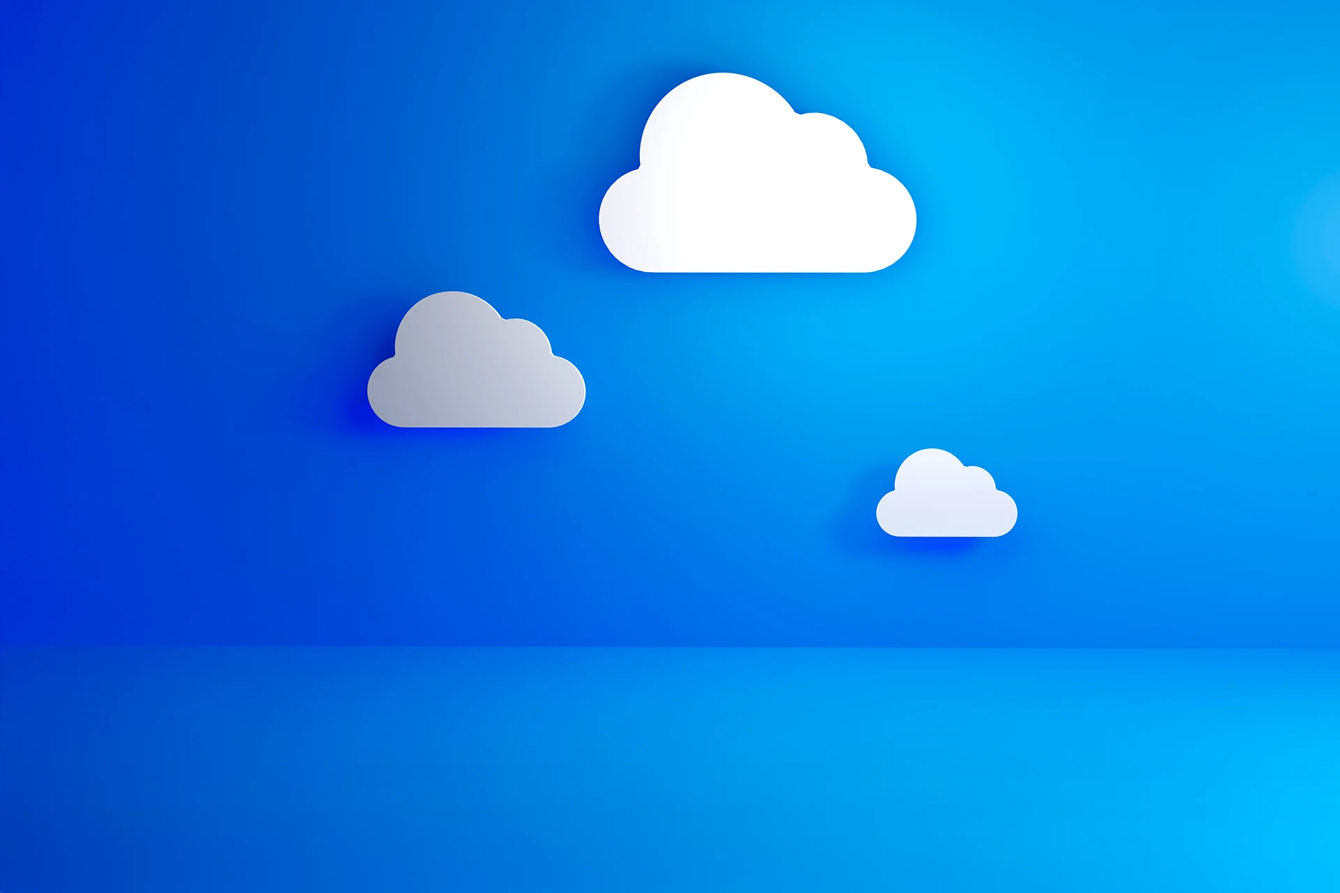 Three stylized clouds on a blue background representing cloud services