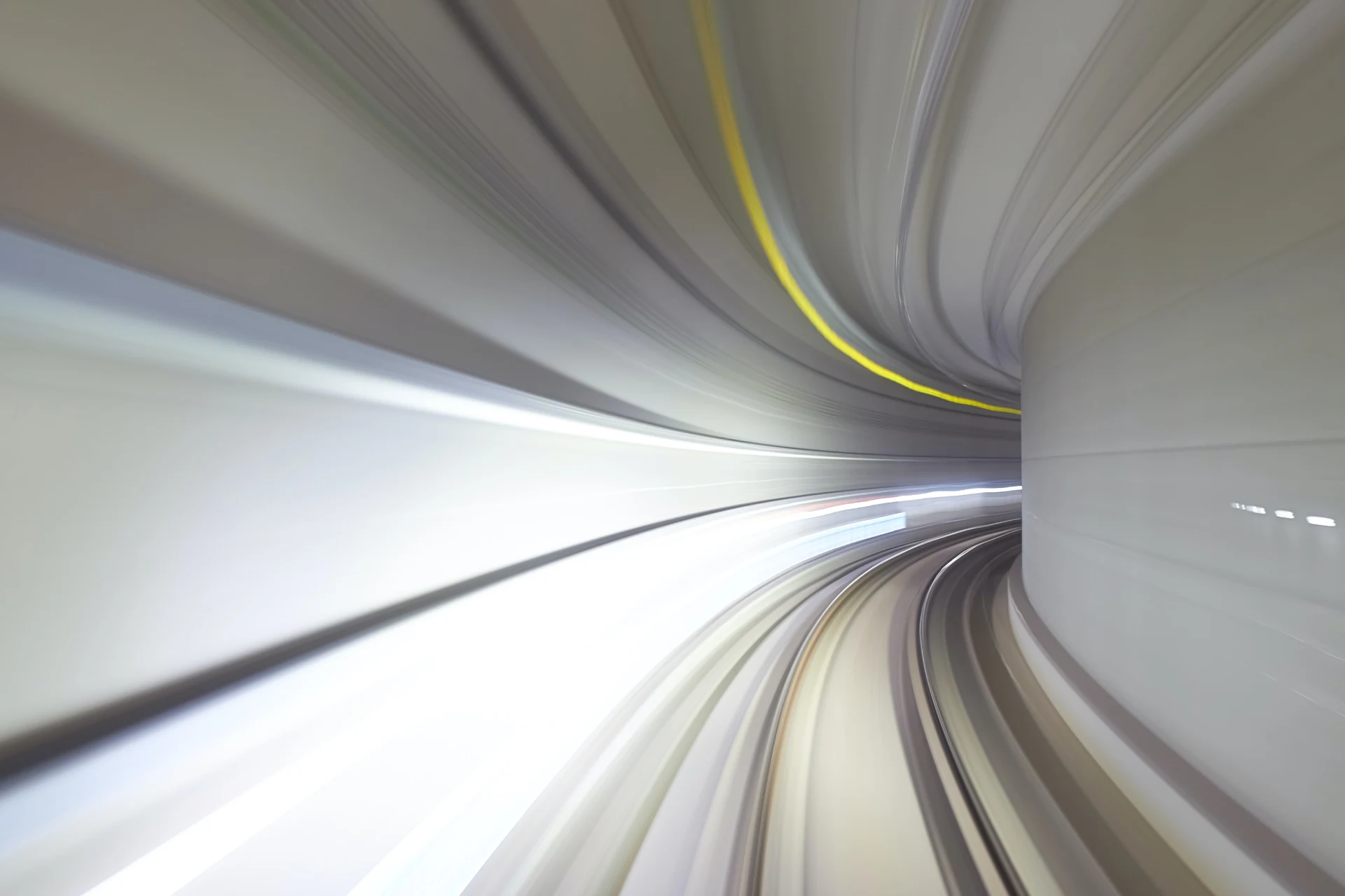 Motion blur of a curved tunnel representing streamlined logistics.