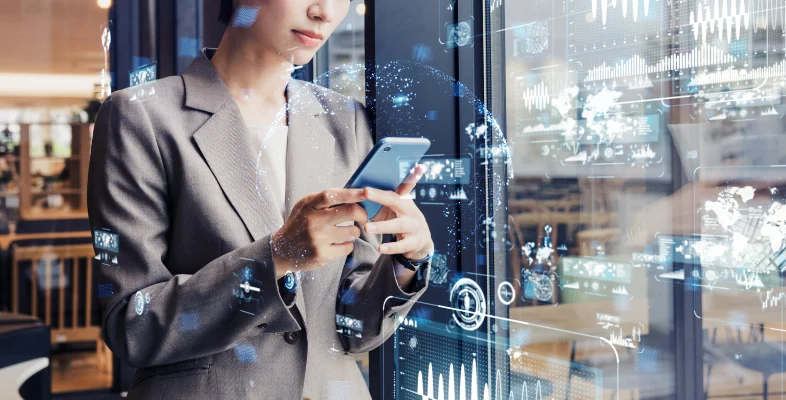 Businesswoman using smartphone with digital data interface layer overlays