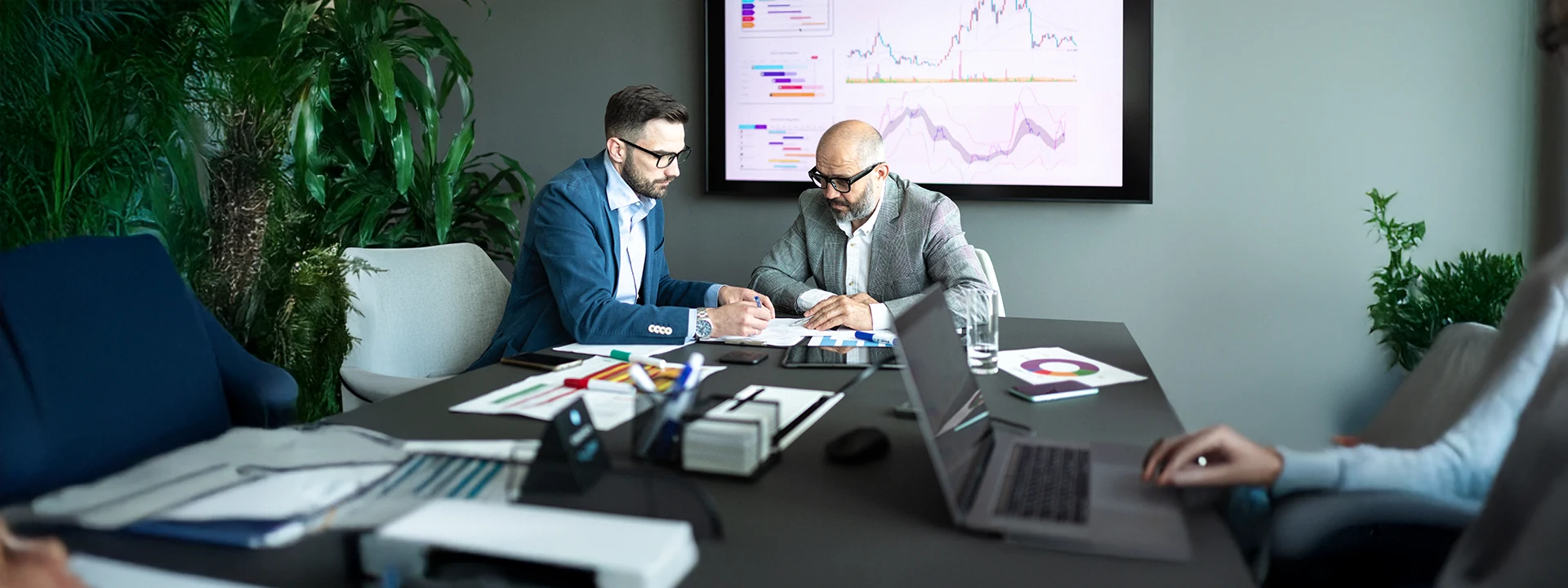 Engaged professionals in a consulting setting for tech sales excellence