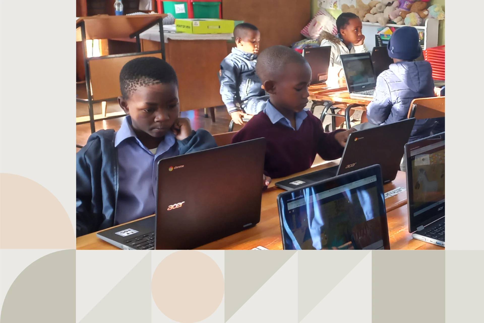 Classroom children using laptops for Tomorrow Trust South Africa education program