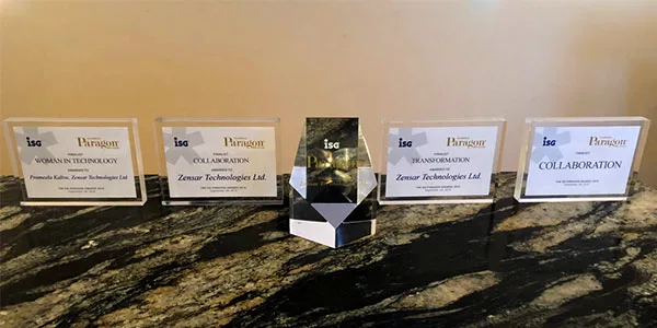 ISG Paragon Awards crystal trophies displayed on table for Zensar Americas