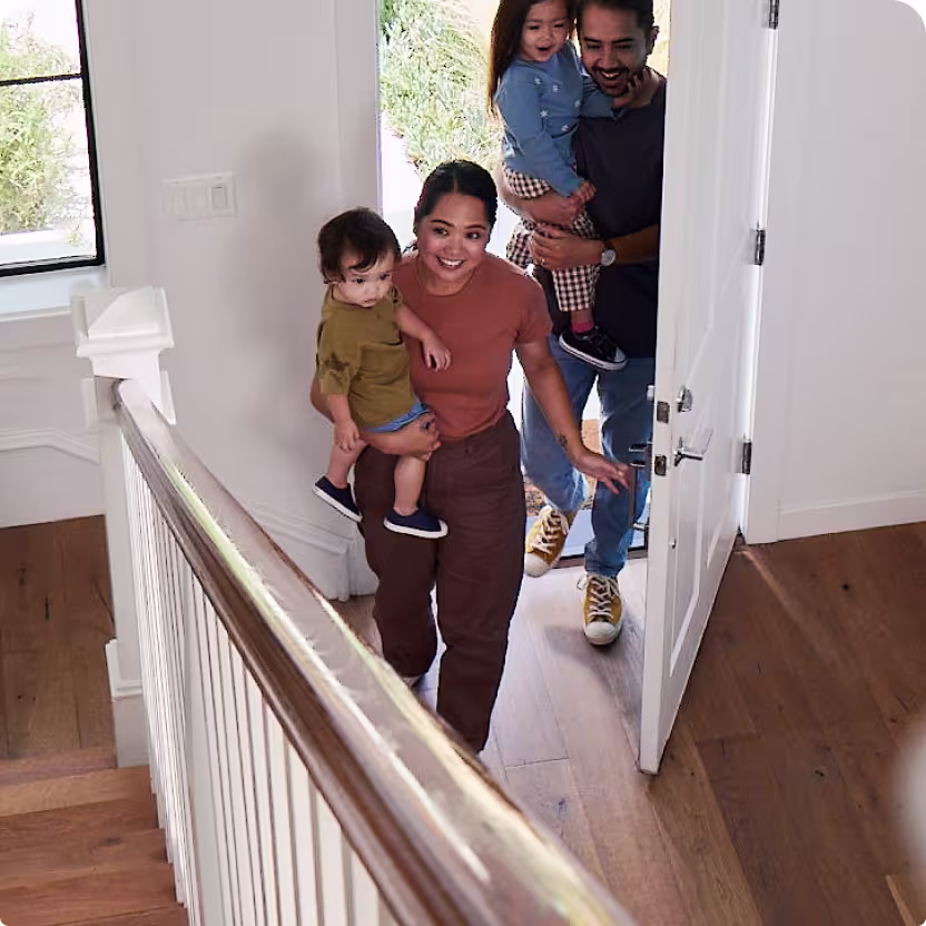 Family entering home
