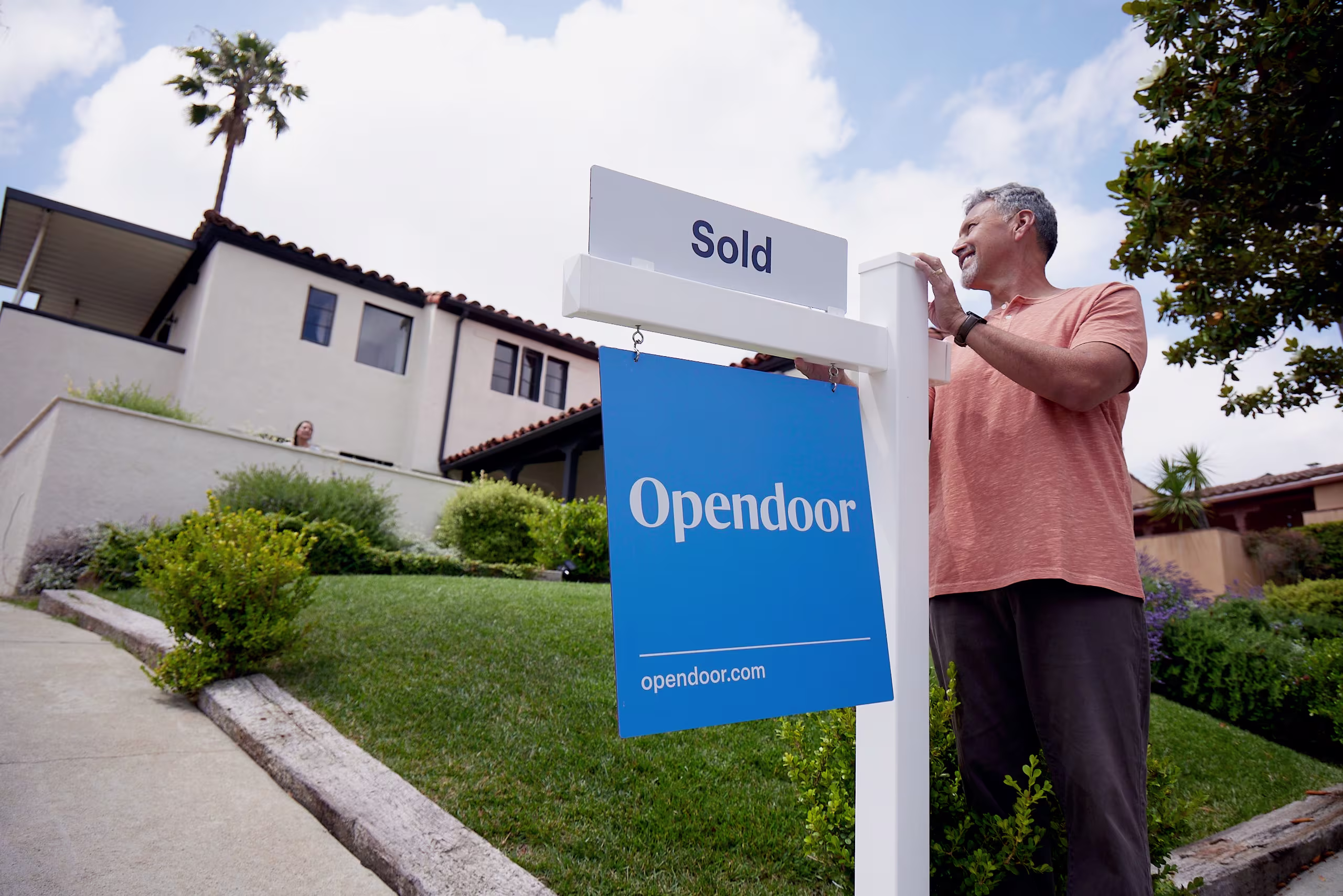 Opendoor sold sign in a front yard