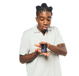 Caleb standing with card