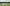 800px-Silage windrows and two tractors 2