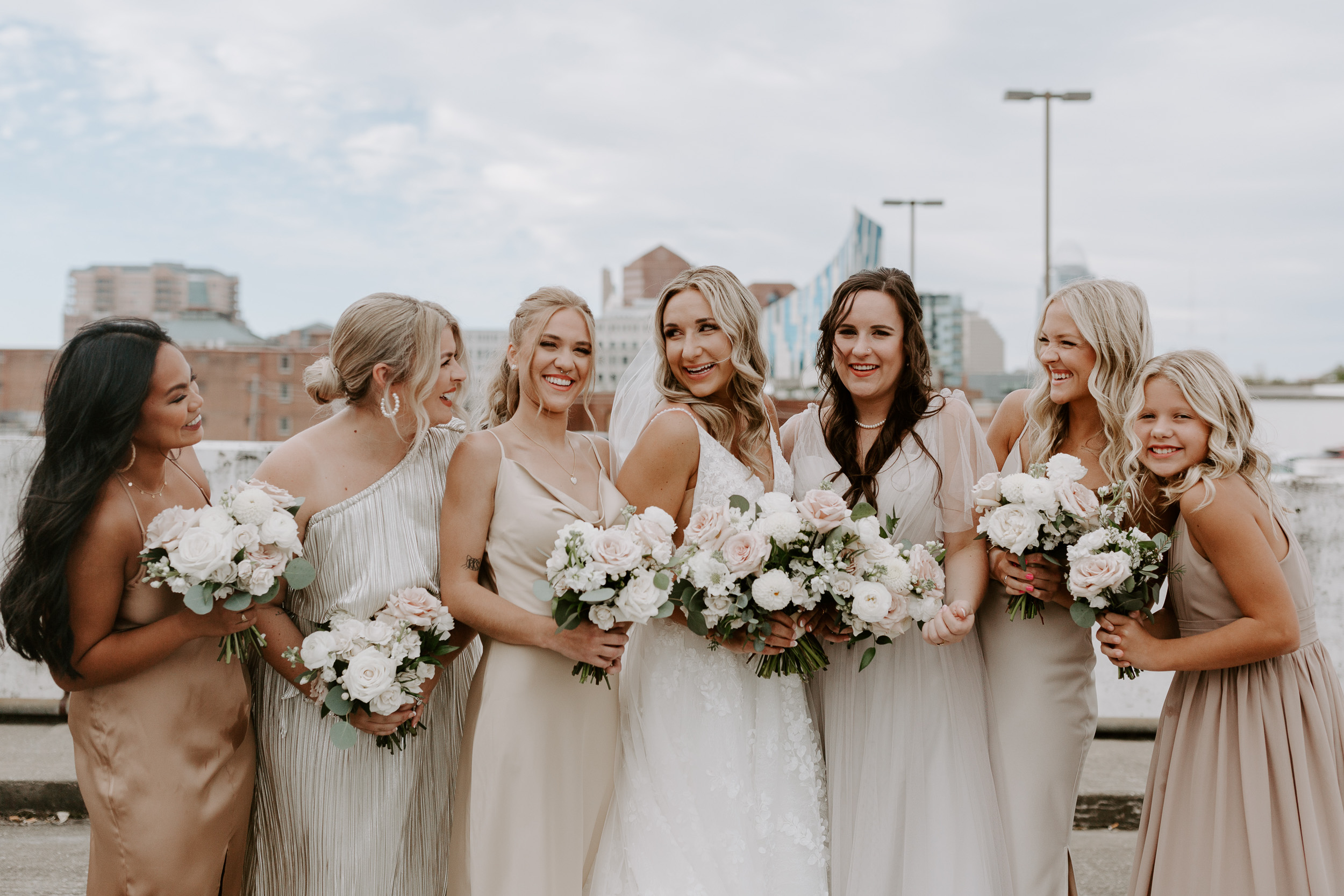 Riverfront bridal party photos with bridesmaids in Covington, Kentucky
