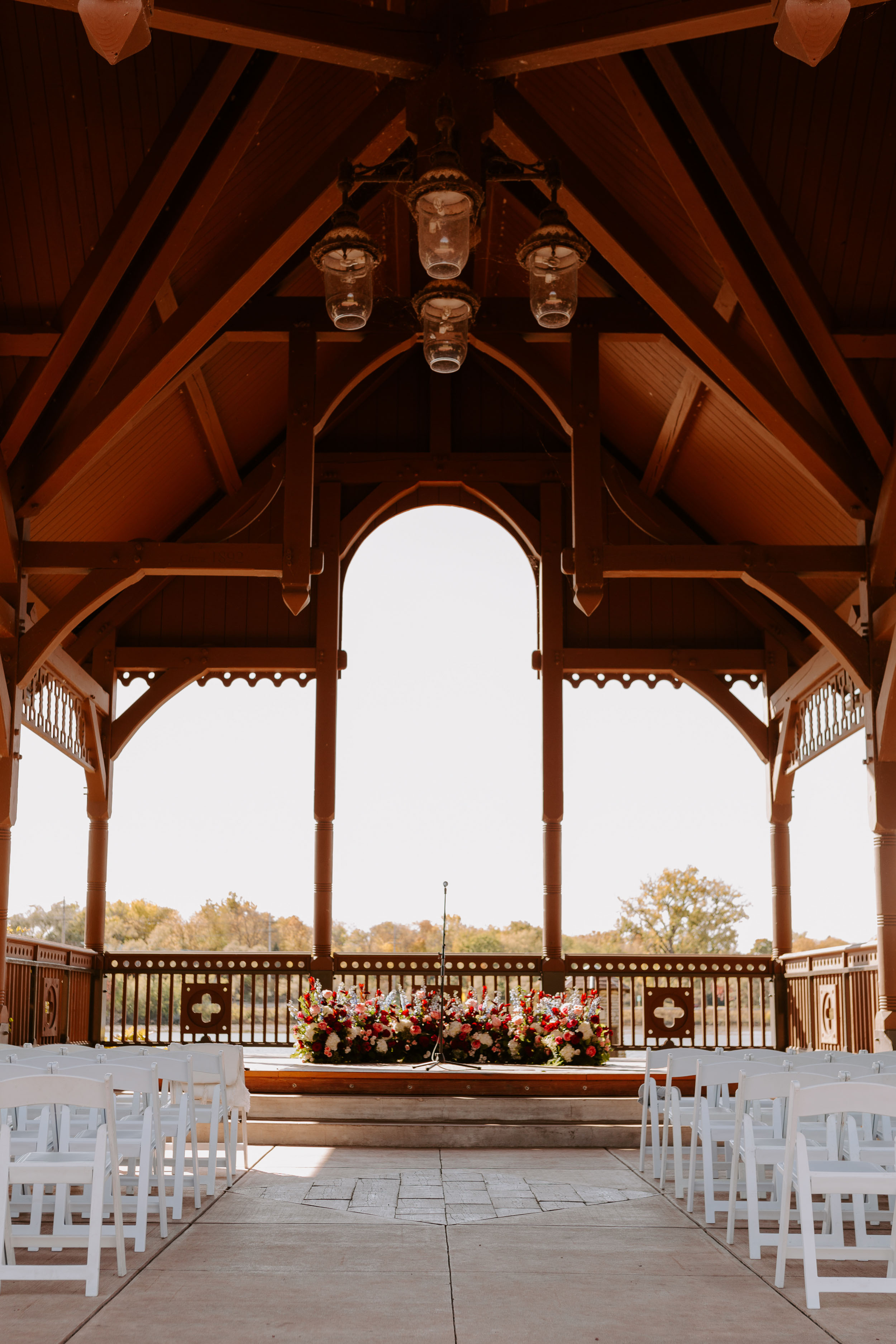 Outdoor fall wedding ceremony in St Charles Illinois at Pottawattamie Park