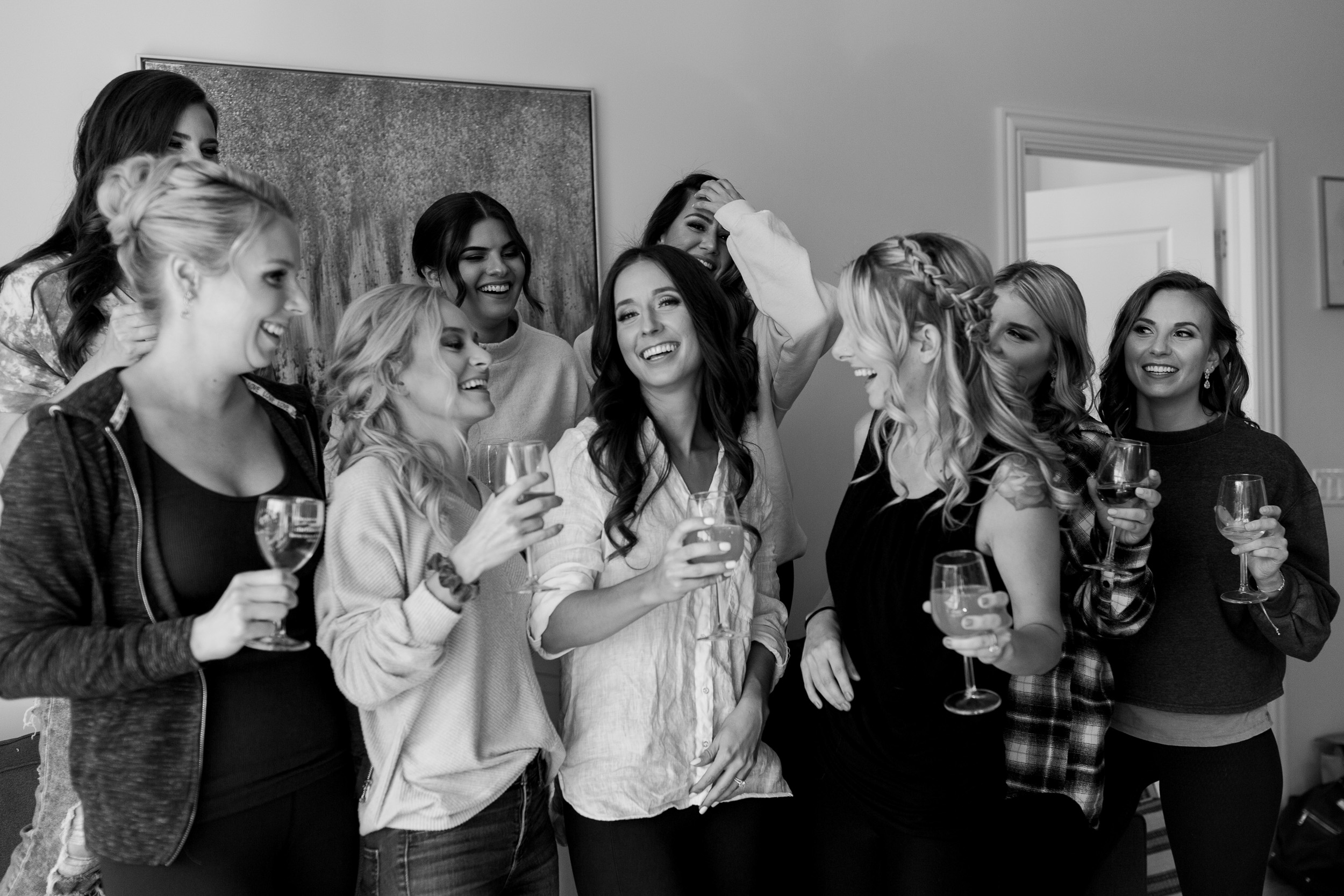 Bride and bridesmaids getting ready for wedding day in West Loop apartment in Chicago
