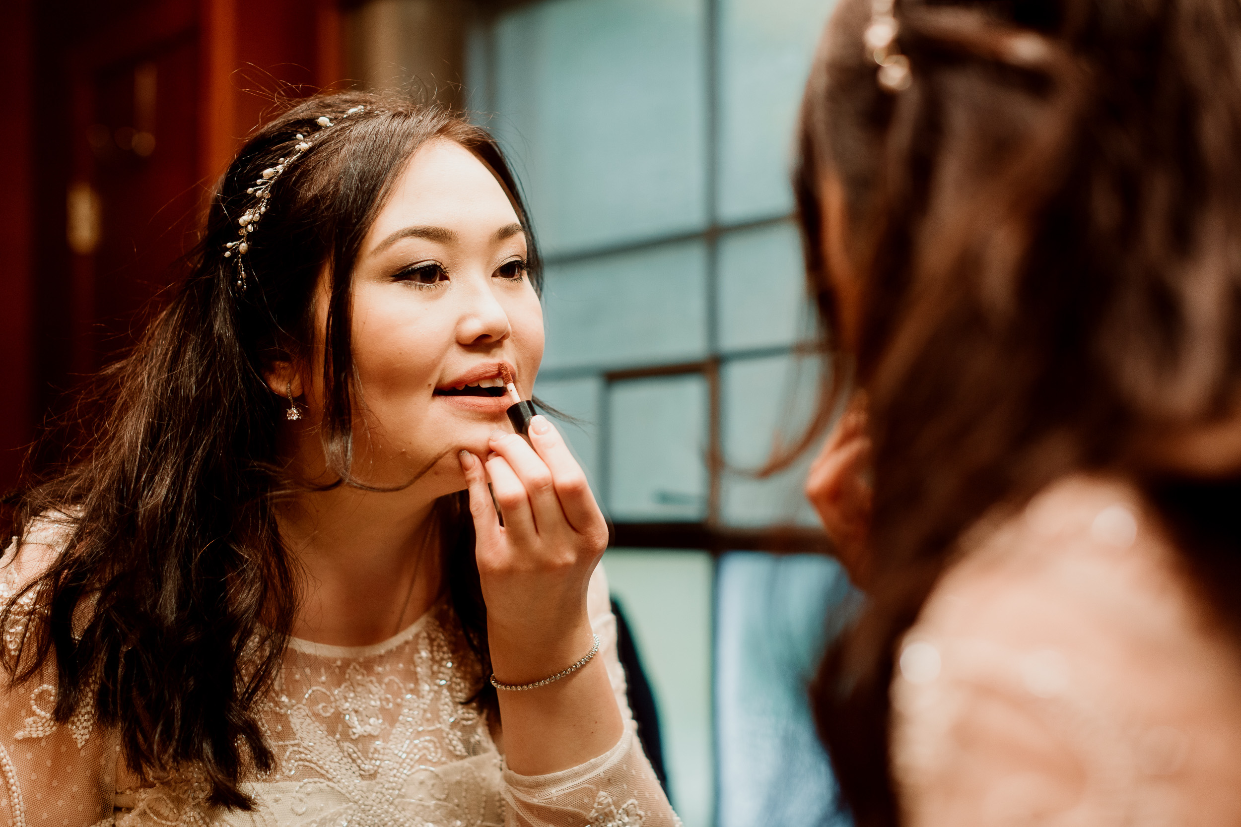 Bride Putting On Lipstick | Bride with Hairpiece | Intimate Elopement in Palos Park IL | The Wayside Chapel at The Center Wedding | The Center Garden Wedding | Rainy Fall Wedding | Fall Chicago Wedding | Elopement Photographer Chicago