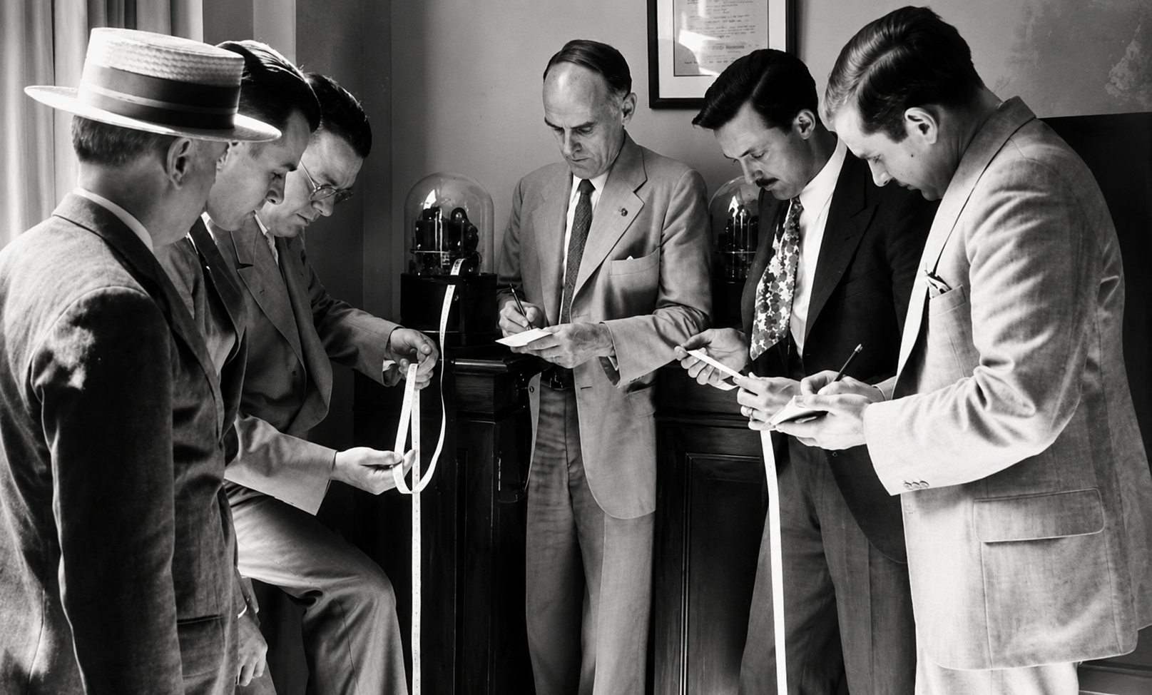 Reading the ticker tape machine, New York, 1930