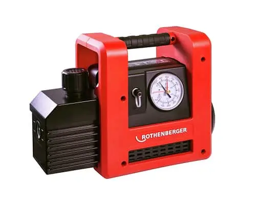 Red and black Rothenberger portable vacuum pump with pressure gauge and carrying handle.