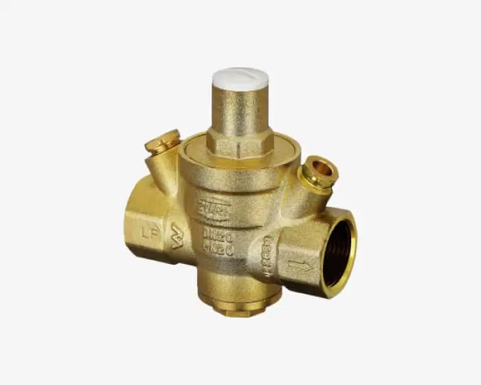 Brass water pressure reducing valve with multiple connection ports and adjustment mechanism on top.