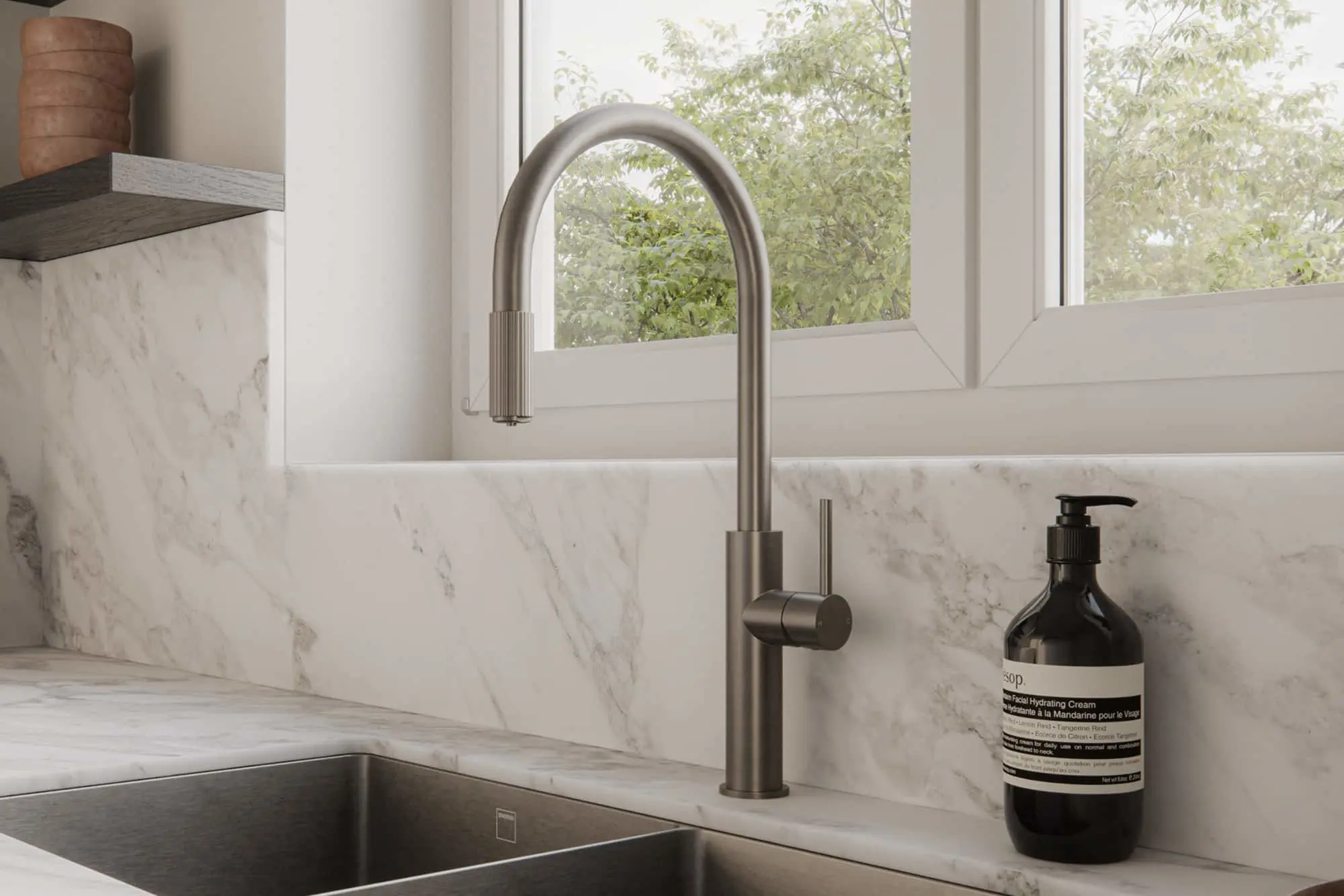Brushed nickel kitchen faucet on white marble countertop with soap dispenser and window in background.
