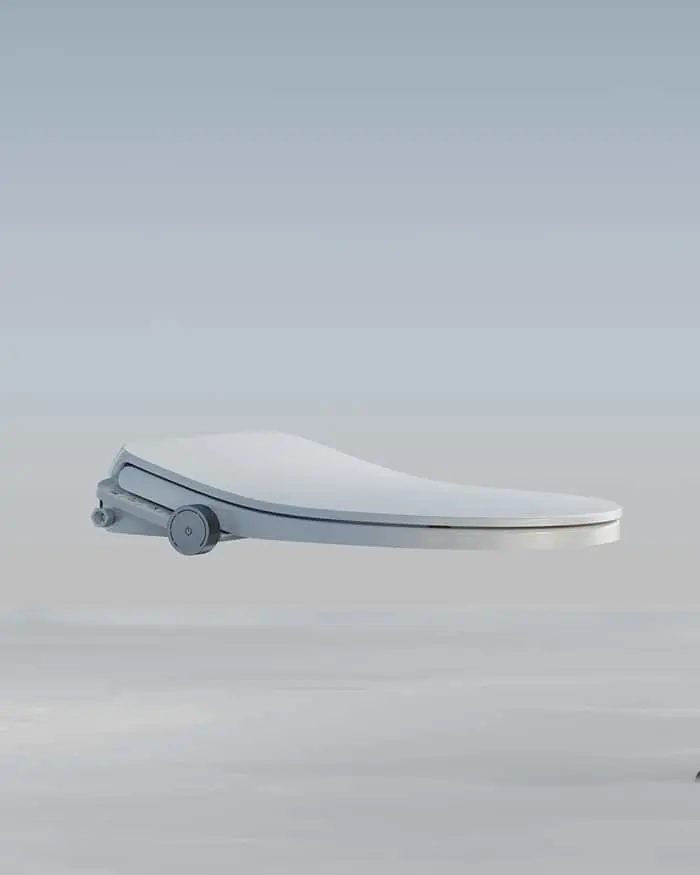A white electronic bidet toilet seat with mechanical components visible, floating against a light gray background.