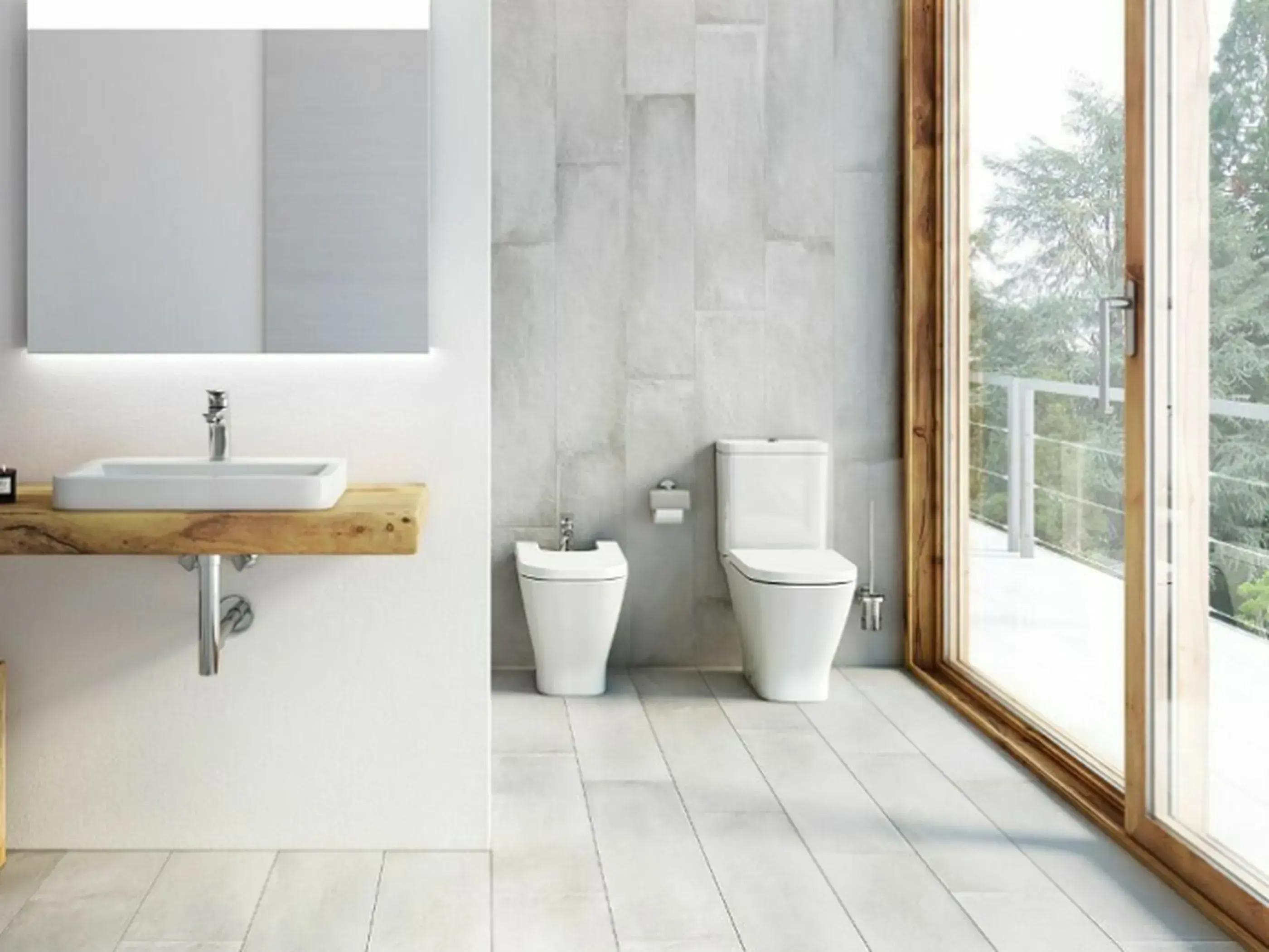 Modern bathroom with white fixtures, wooden sink counter, light tile walls, and large glass doors overlooking trees.