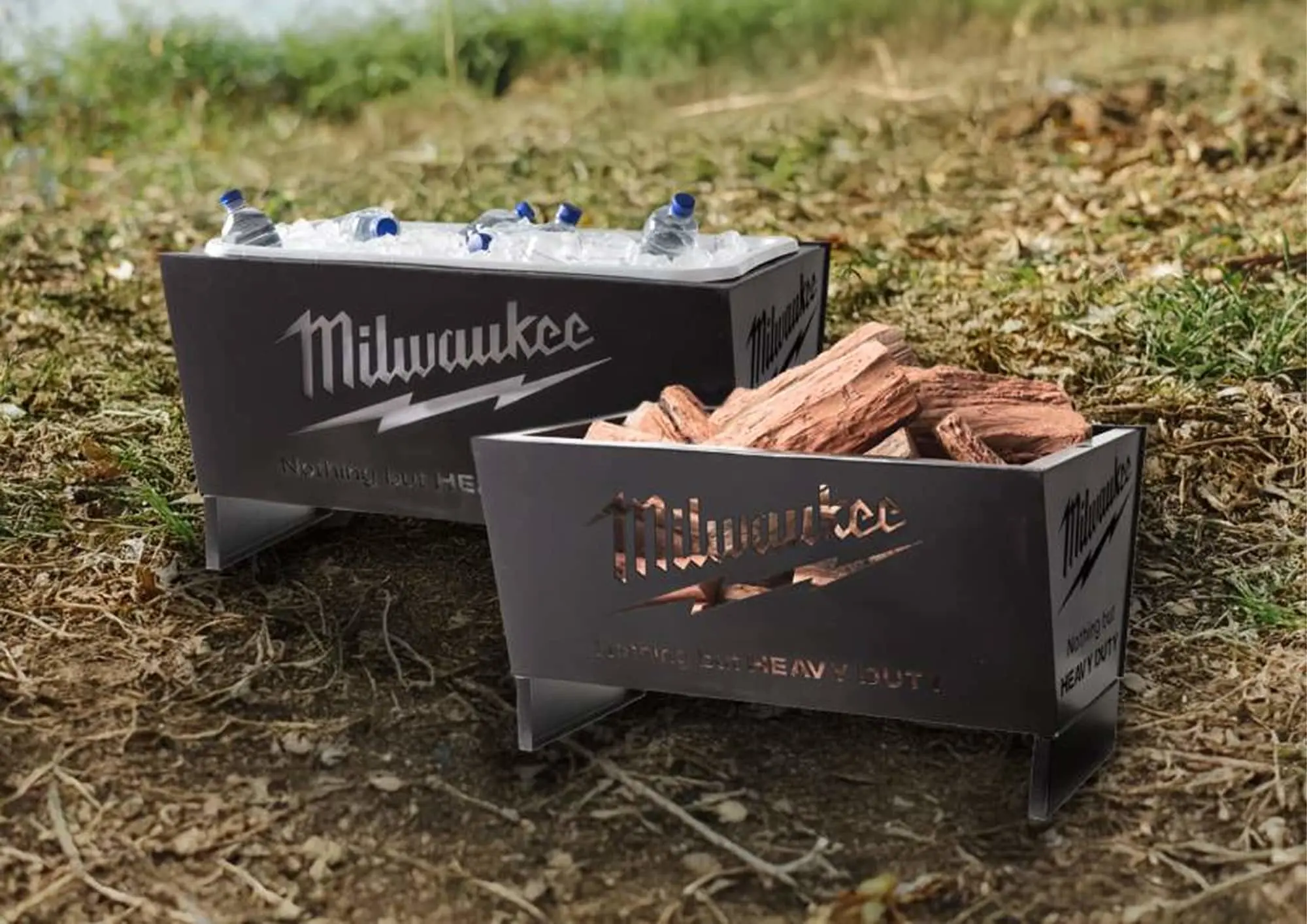 Two black Milwaukee metal containers outdoors - one holding water bottles on ice, the other filled with firewood.