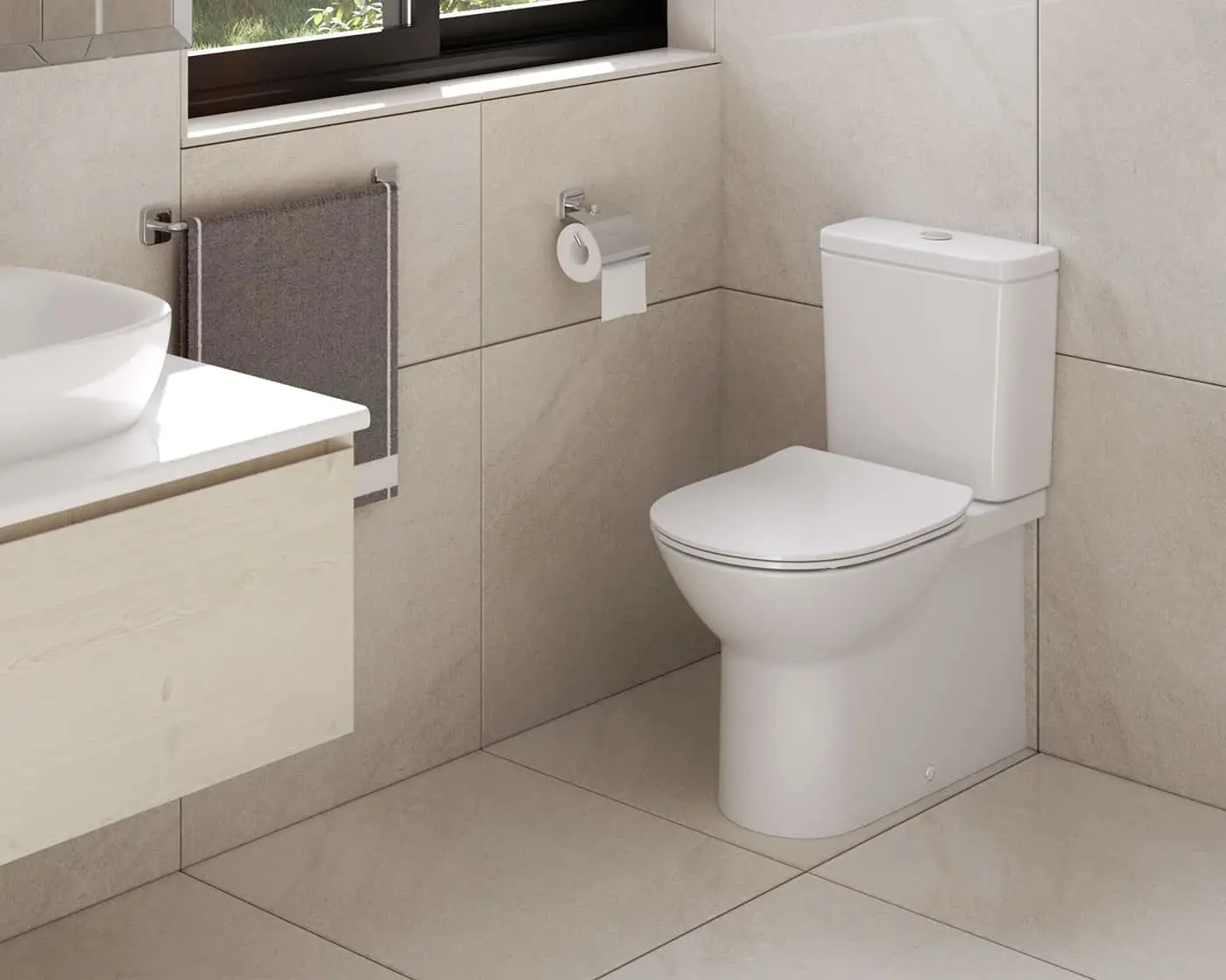 Modern bathroom with white toilet, sink, beige tiled walls, gray towel, and small window above.