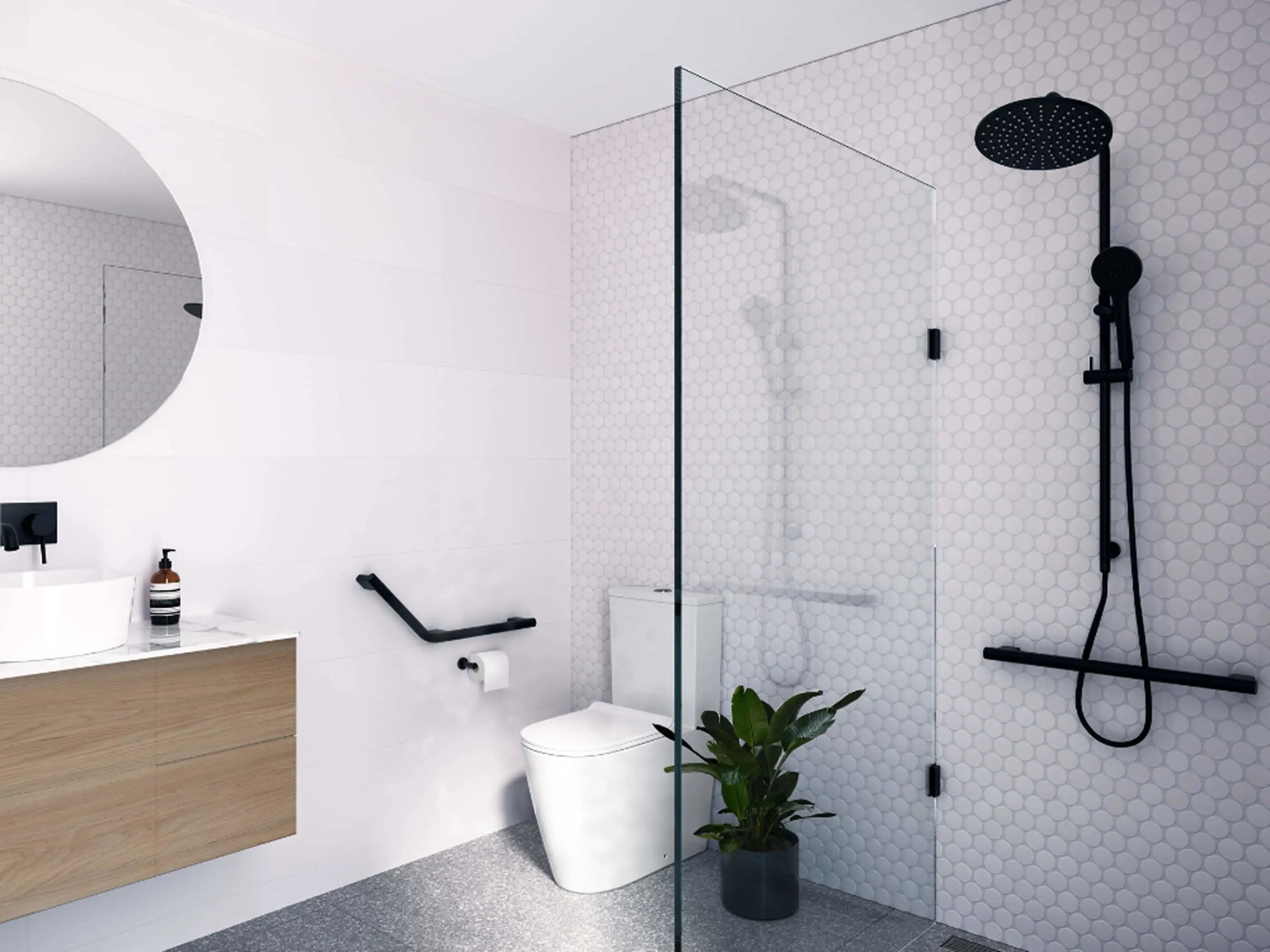 Modern white bathroom with hexagon tile shower, black fixtures, wooden vanity, round mirror, and potted plant.