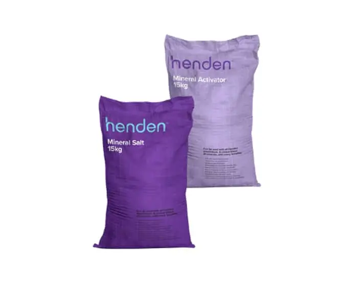 Two Henden product bags - purple Mineral Salt and light purple Mineral Activator, both 15kg, against white background.