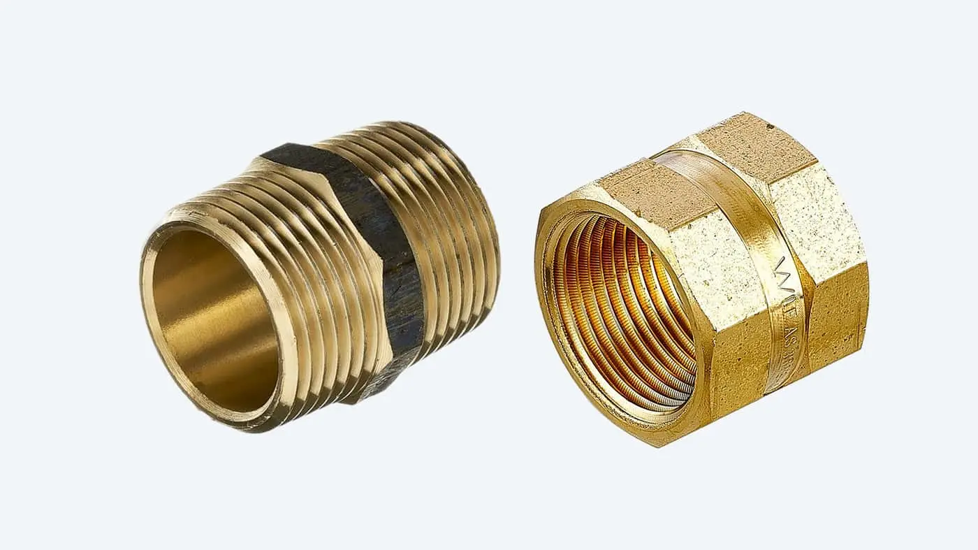 Two brass plumbing fittings: a threaded pipe nipple on the left and a hexagonal adapter fitting on the right.