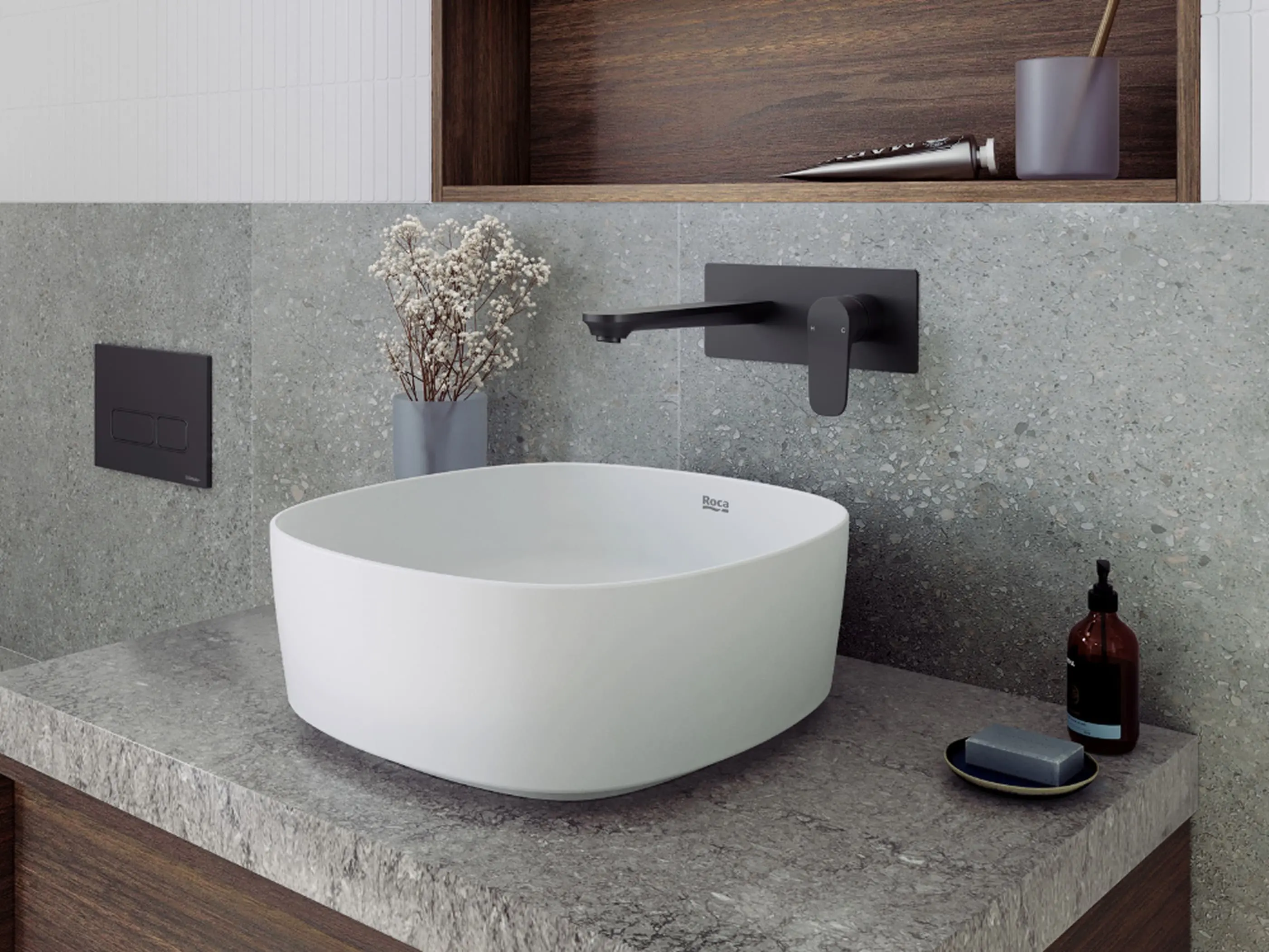 Modern bathroom with white vessel sink, black wall-mounted faucet, gray stone countertop, and minimalist decor.