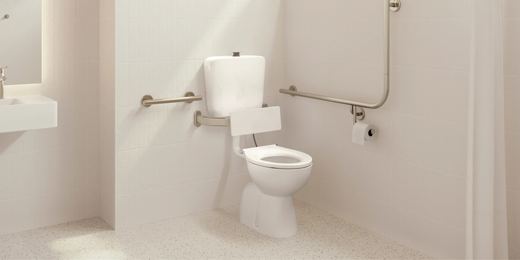 White accessible bathroom with a toilet, grab rails, toilet paper holder, and a sink visible in the background.