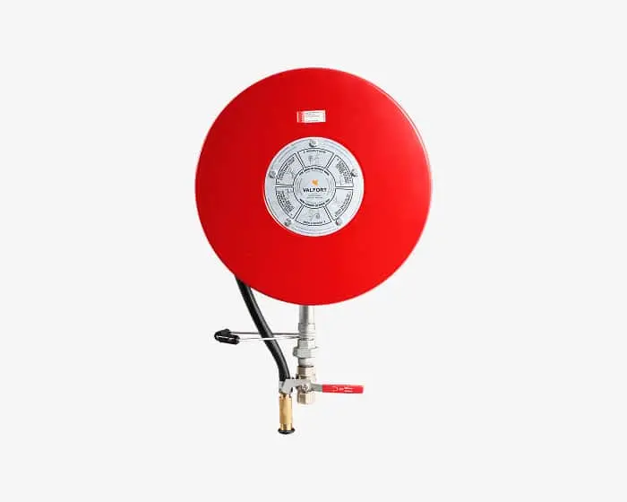 Red fire hose reel with circular metal center dial and valve attachment against white background.