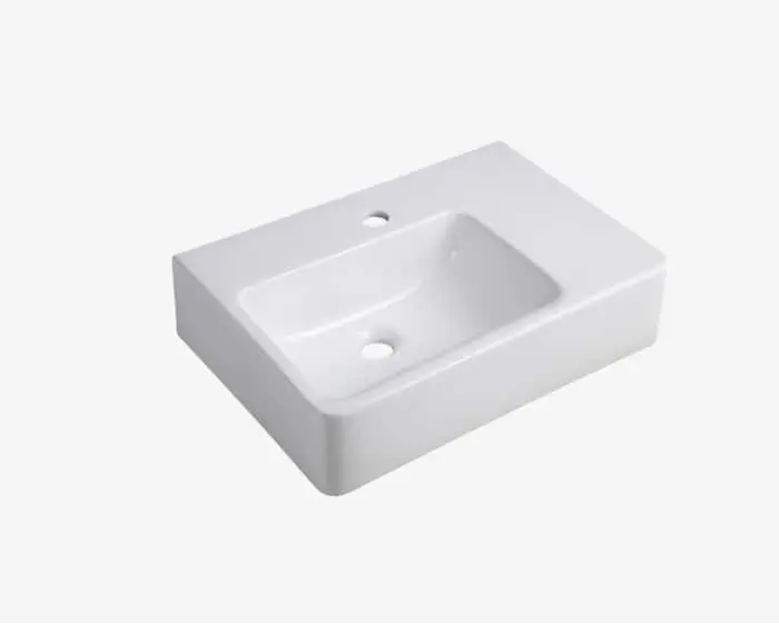 Wolfen wall-hung basin with shelf on the right hand side.