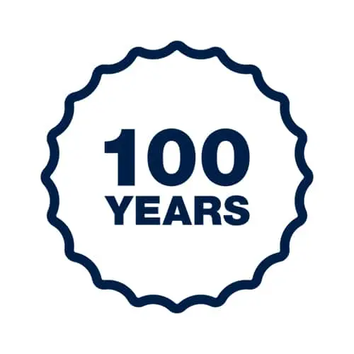 Dark blue circular badge with scalloped edges displaying "100 YEARS" in bold text.