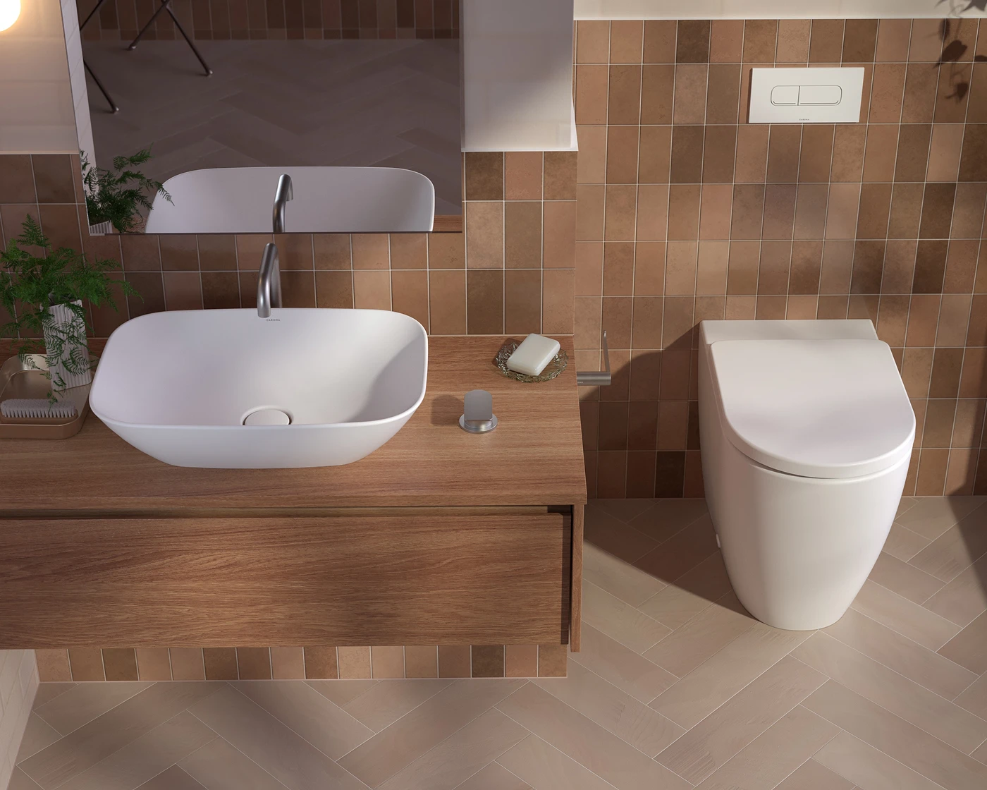 Modern bathroom with white vessel sink on wooden vanity, white toilet, and brown tiled walls with herringbone floor pattern.