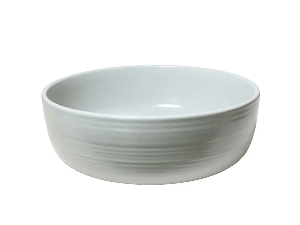 Robert Gordon above counter basin in dove speckled finish.