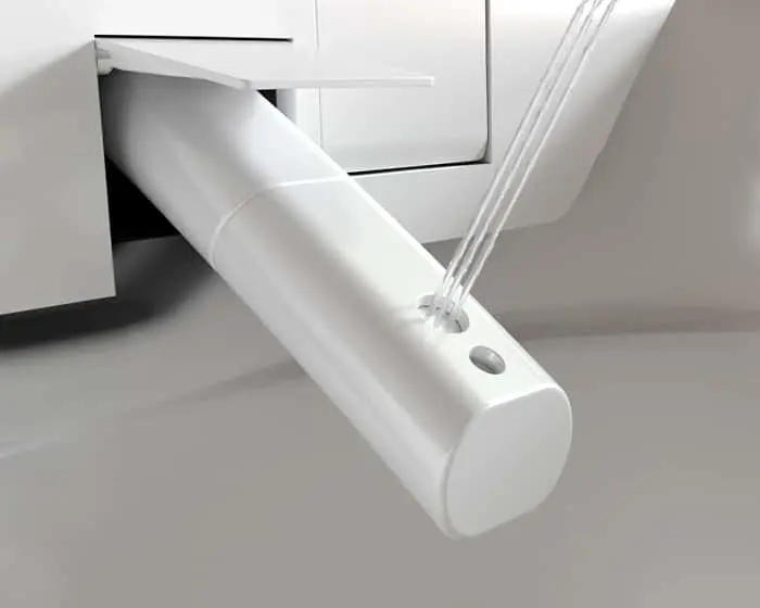 Smart toilet self-cleaning nozzle spraying water.