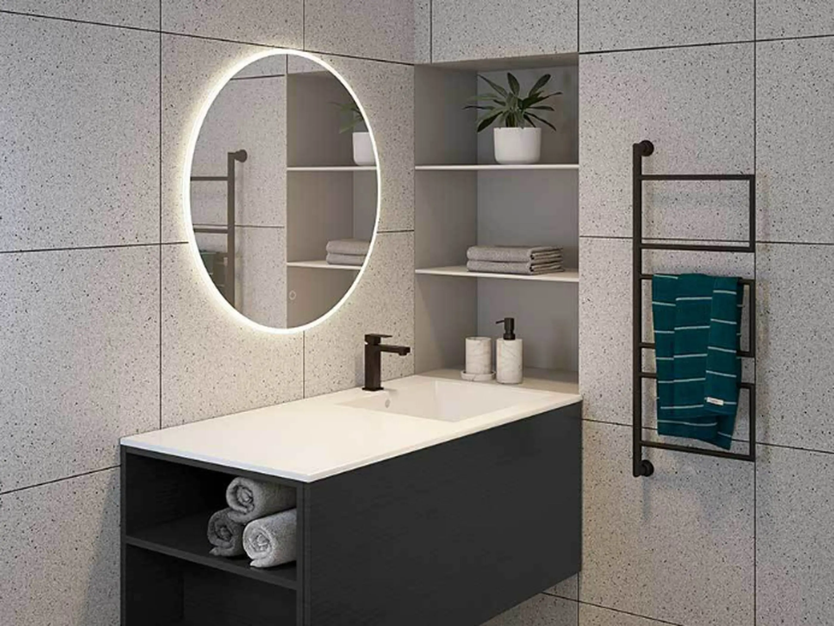 Modern bathroom with illuminated round mirror, black vanity, built-in shelving, and teal towel on wall-mounted rack.