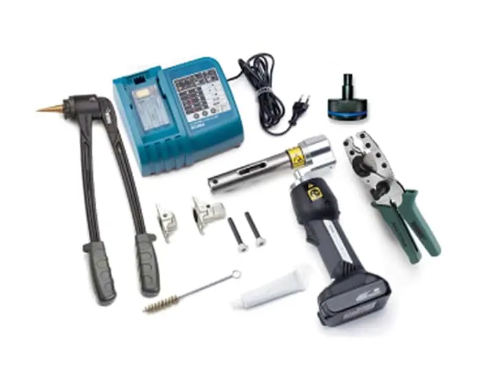 Set of power tools including blue battery charger, cordless drill, crimping tool, and various accessories on white background.