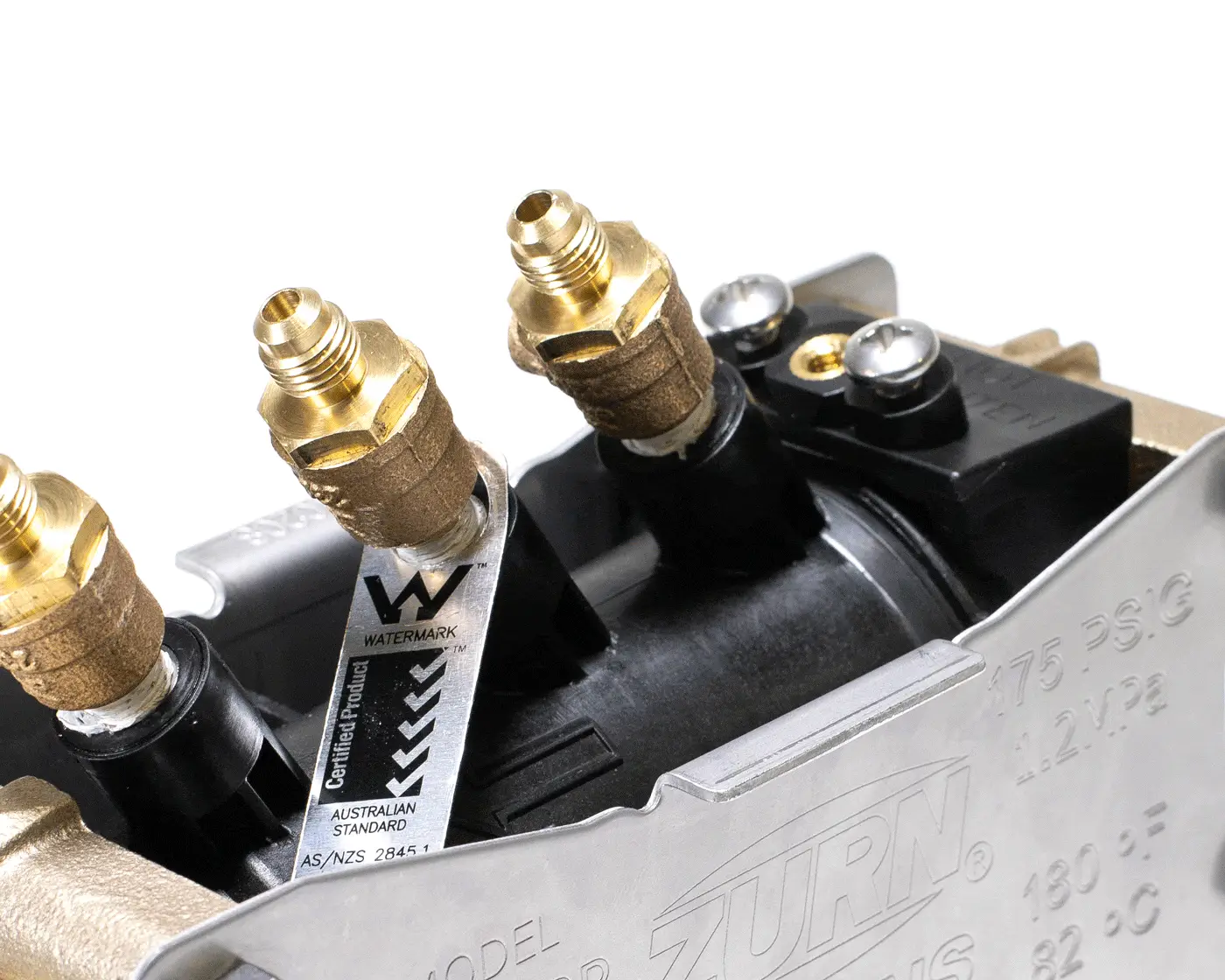 Close-up of plumbing fixture with brass fittings, Watermark certification tag, and Australian Standard label.