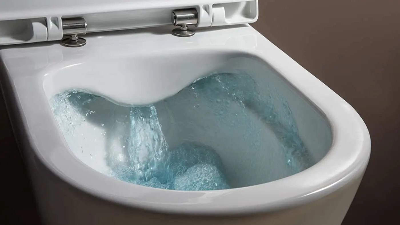 White toilet bowl with blue water flushing, showing water flow from multiple jets around the rim.