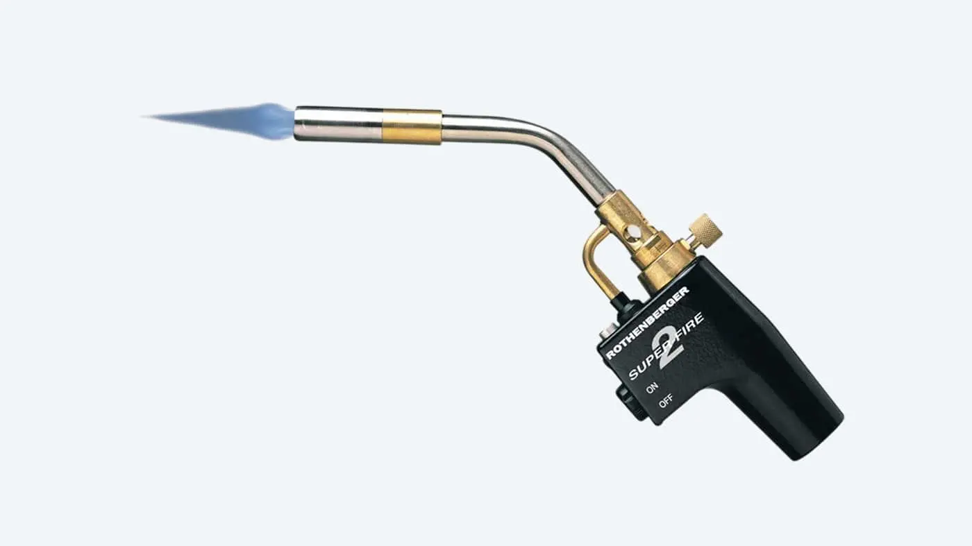 Rothenberger Super Fire 2 blowtorch with black handle, brass fittings, and curved stainless steel nozzle on white background.
