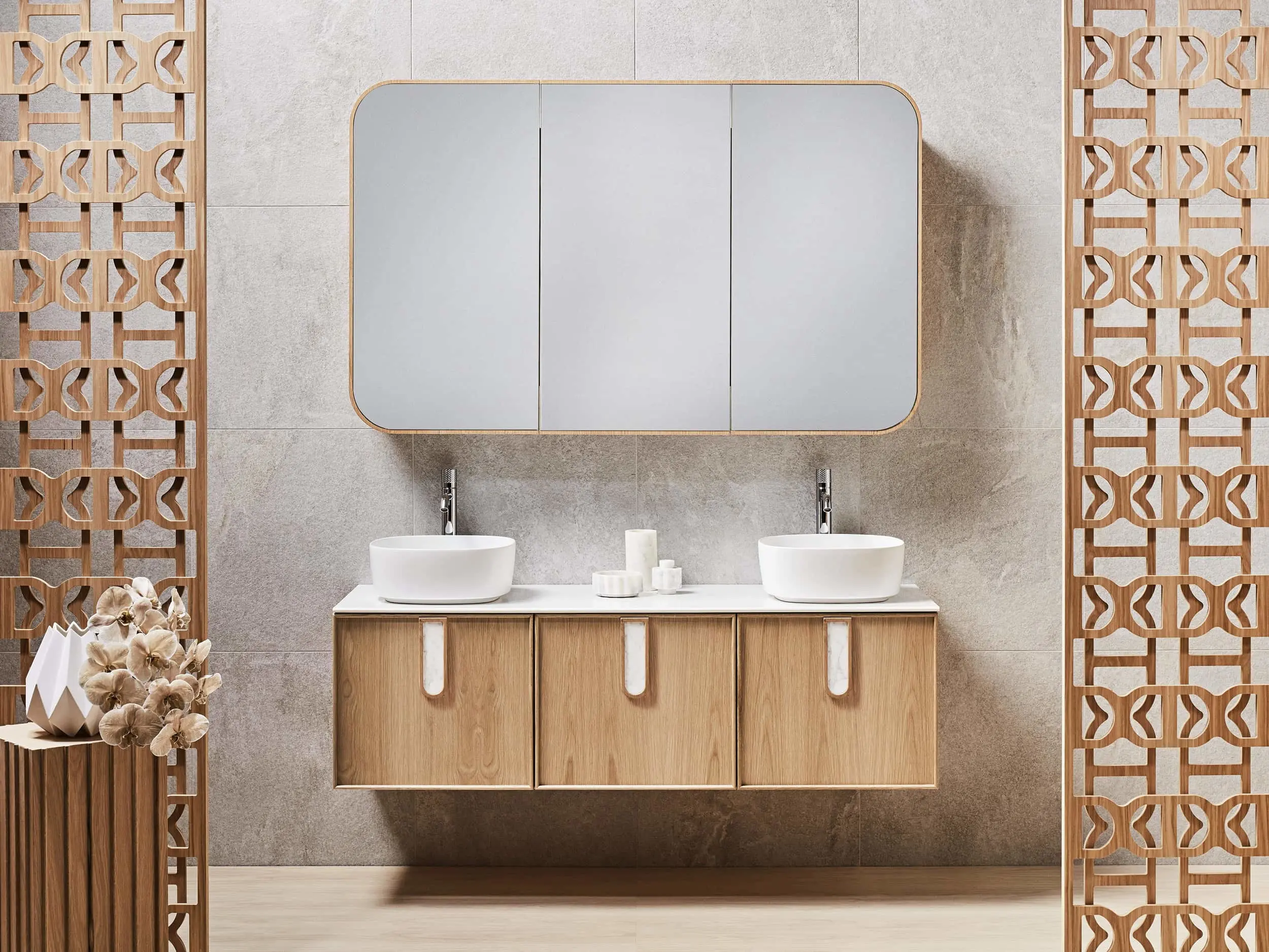 Modern bathroom with wooden vanity, dual white vessel sinks, mirrored cabinet, and decorative wooden screens on sides.